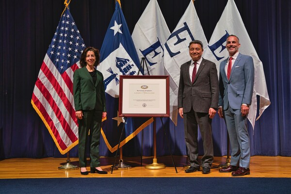 ACT Receives President's E Award from U.S. Secretary of Commerce Gina Raimondo. Pictured from left to right is Secretary Gina Raimondo, Jon Zuo, President ACT, Adam Say, International Business Development Manager, ACT.