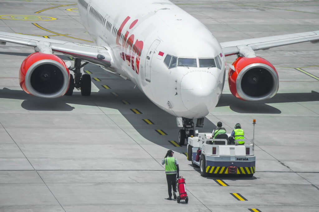 Taxiiing plane on runway