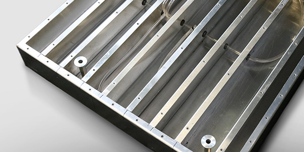 Phase change material heat sinks for absorbing heat during transients