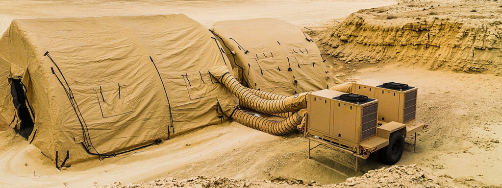 Photo of military tents with Environmental Control Units attached to ducts to regulate temperatures.